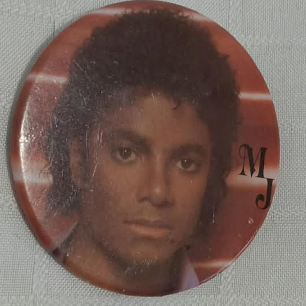 Strange & unusual vintage button pin featuring Michael Jackson